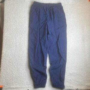 Vintage Nike men's blue track pants loose fit white tag 90s xl
